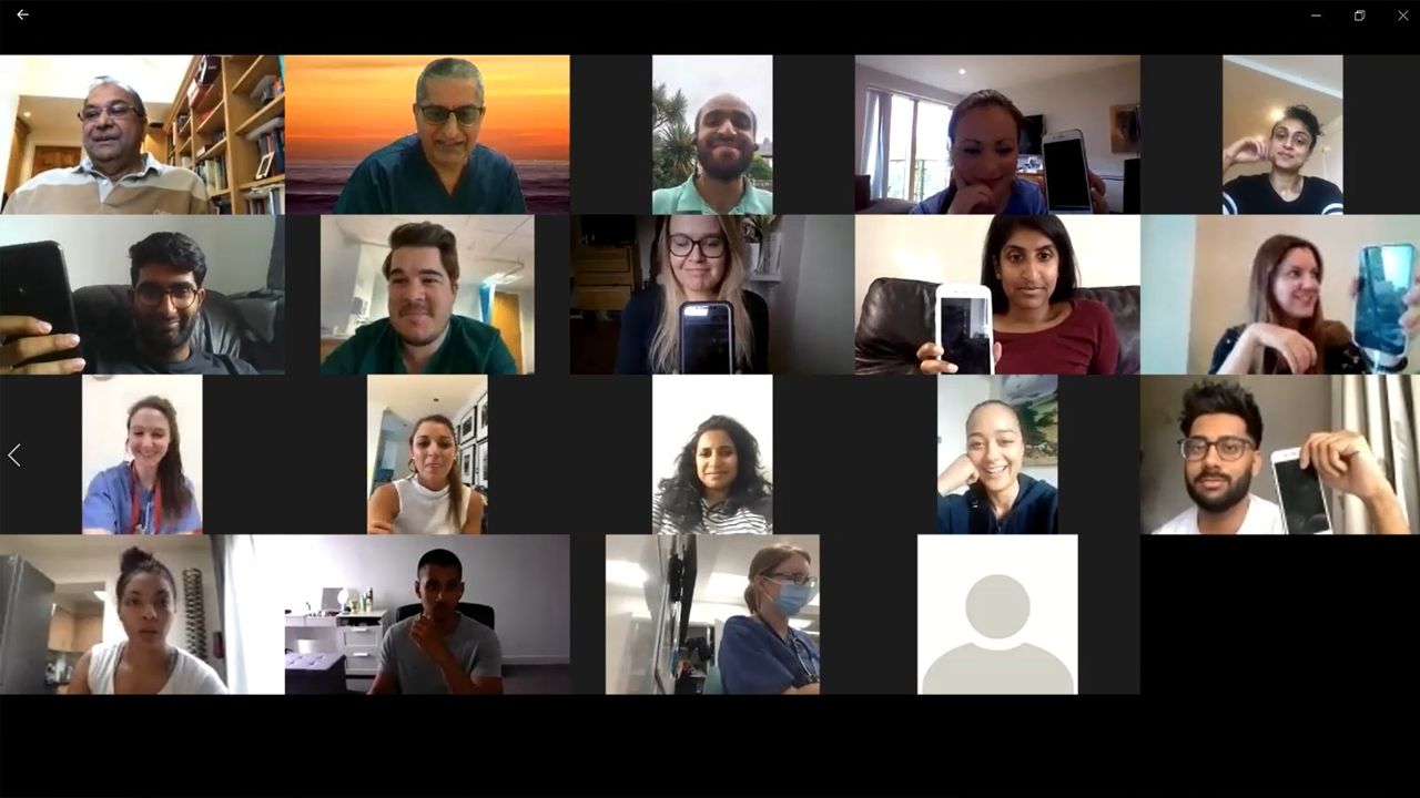 Screenshot of GP trainees on a video call. They are all holding up their mobile phones.